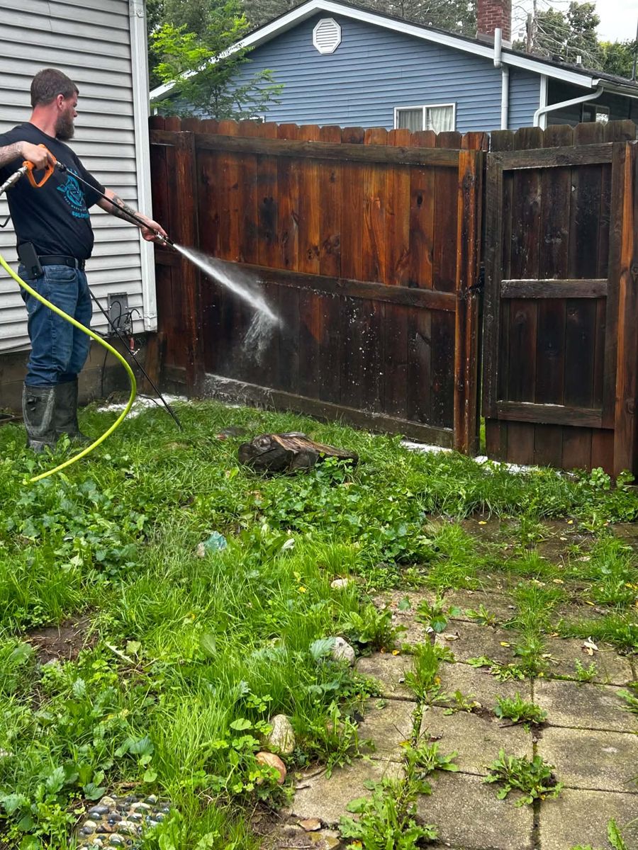 Washing a fence gate