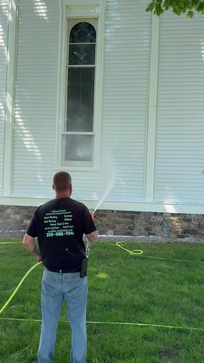 Washing church siding